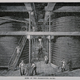 Fermenting backs and workers in a whiskey distillery. Wood engraving, late 19th century.
